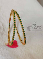 Load image into Gallery viewer, Beautiful Pair of Bangles in Small Emeralds
