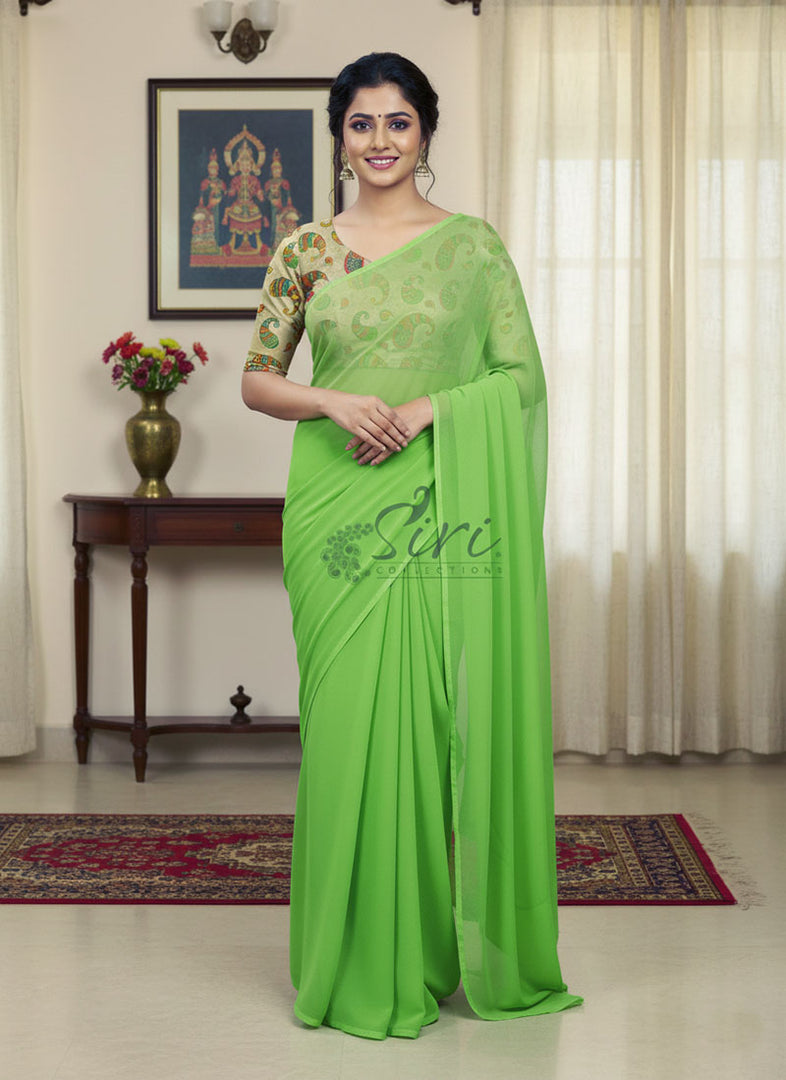 Lovely Crepe Georgette Saree With Printed Blouse