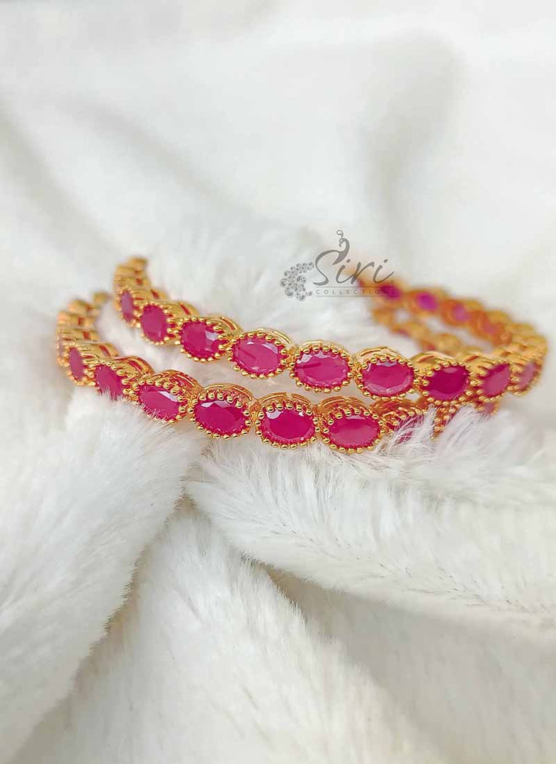 Designer Pair Of Bangles in Ruby Stones