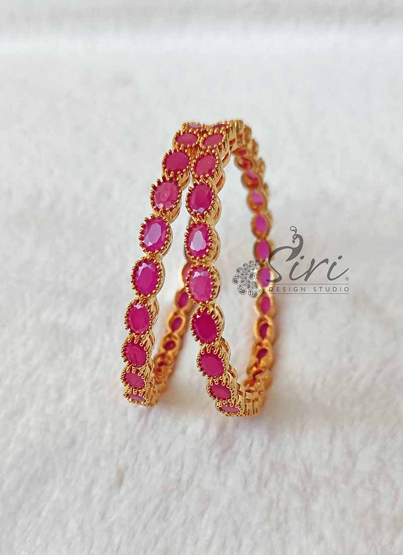 Designer Pair Of Bangles in Ruby Stones