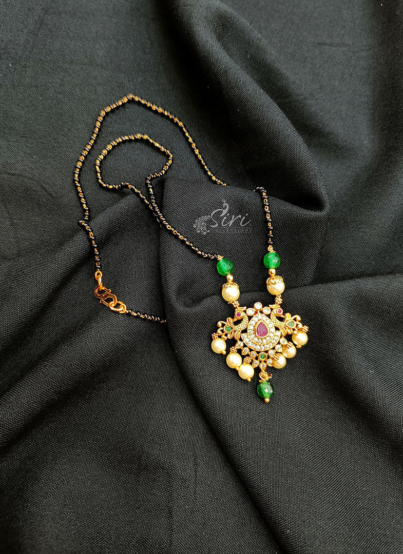 Lovely Black Beads Chain in Peacock Design Pendant