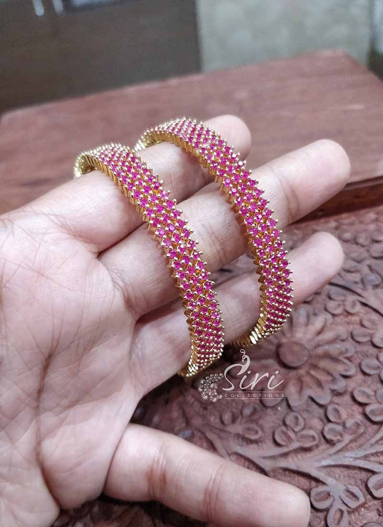 Designer Pair of Bangles in Small Ruby Stones