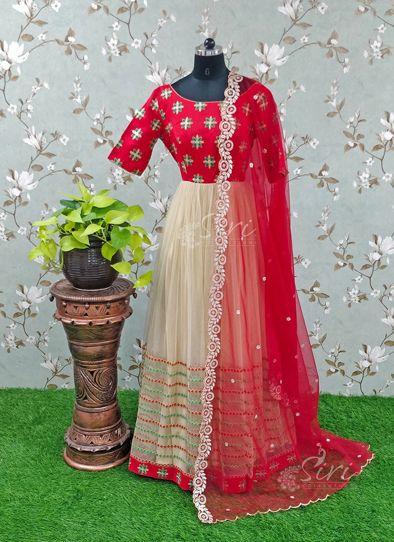 Beautiful Partywear Long Frock In Net Embroidery And Raw Silk